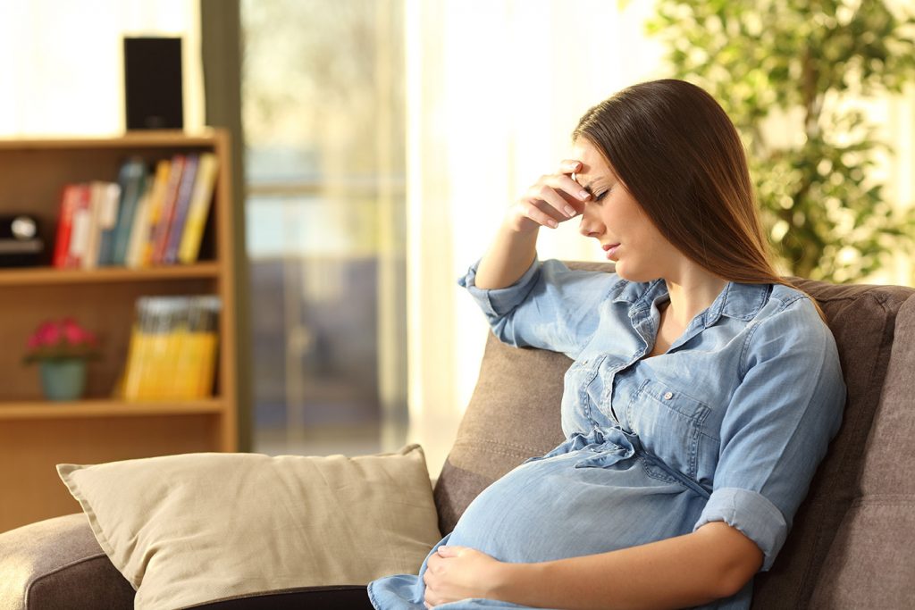 unhappy pregnant woman 