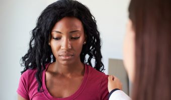 Woman Talking to Doctor