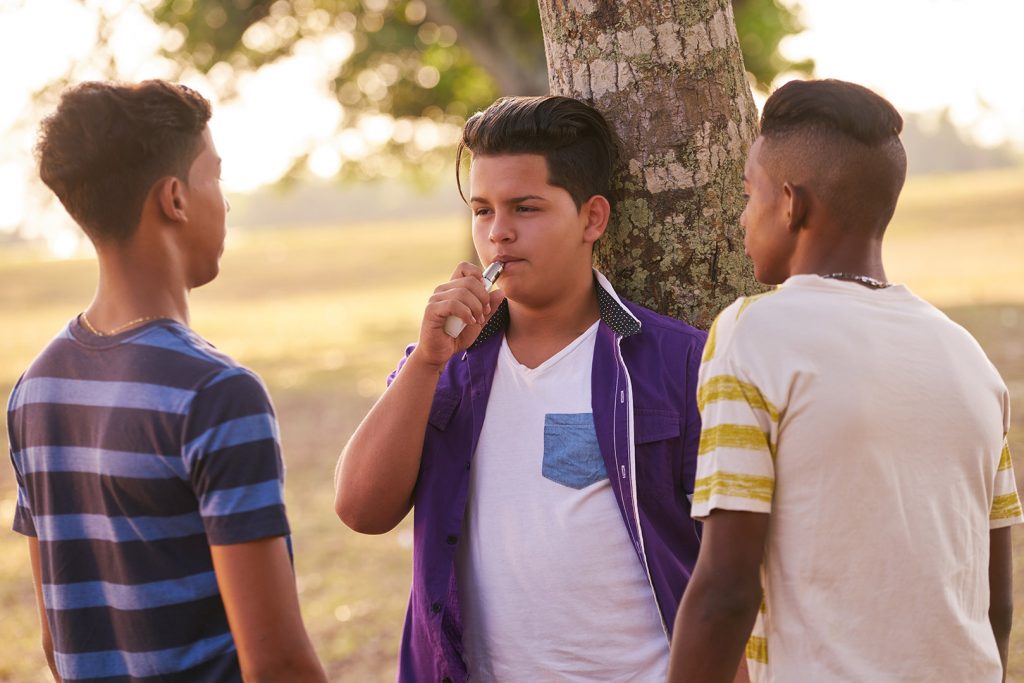 Teens Smoking E-Cig