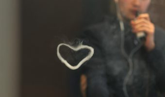 Cool Vaper Dude Blowing Smoke Rings in the Shape of Heart Even As He Damages His Own