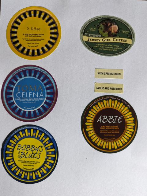 Product images of S Kase, Toma Celena, Bobby’s got the Blues, Jersey Girl with spring onion, Jersey Girl with garlic and rosemary, and Abbie cheese products