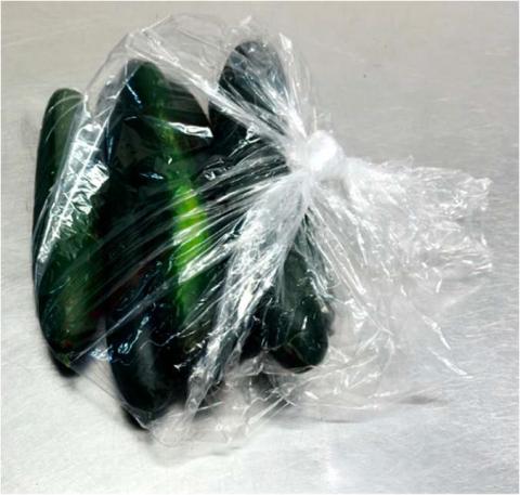 Whole cucumbers in clear plastic bag