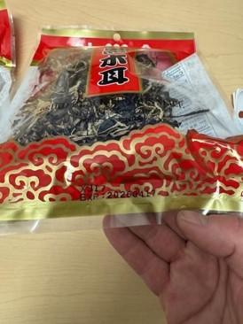 Photo of labeling, Dried Black Fungus Slice, showing lot code, front of package